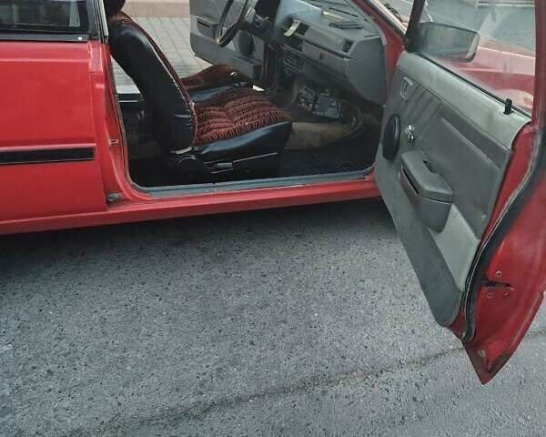 Красный Ниссан Санни, объемом двигателя 1.5 л и пробегом 318 тыс. км за 950 $, фото 7 на Automoto.ua