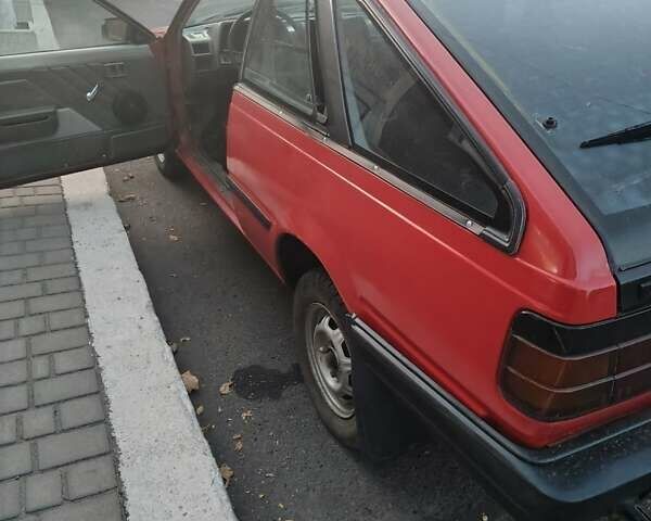 Красный Ниссан Санни, объемом двигателя 1.5 л и пробегом 318 тыс. км за 950 $, фото 2 на Automoto.ua