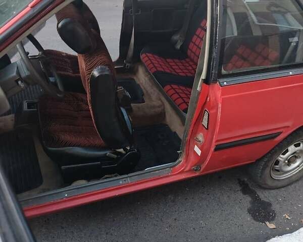 Красный Ниссан Санни, объемом двигателя 1.5 л и пробегом 318 тыс. км за 950 $, фото 5 на Automoto.ua