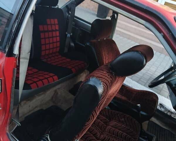 Красный Ниссан Санни, объемом двигателя 1.5 л и пробегом 318 тыс. км за 950 $, фото 3 на Automoto.ua