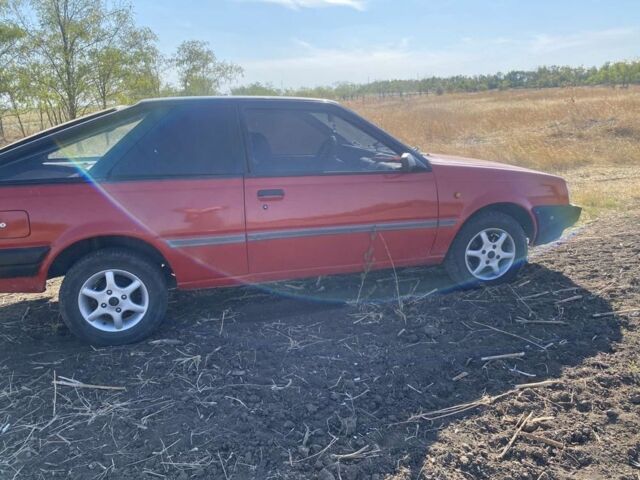 Червоний Ніссан Санні, об'ємом двигуна 1.5 л та пробігом 374 тис. км за 1000 $, фото 2 на Automoto.ua