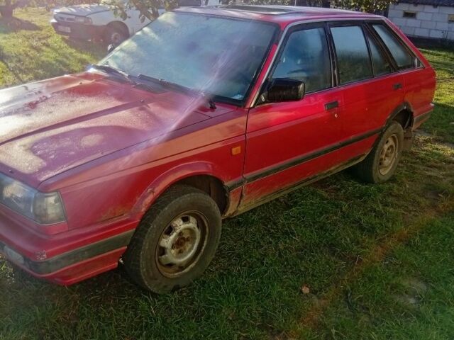 Красный Ниссан Санни, объемом двигателя 1 л и пробегом 600 тыс. км за 850 $, фото 3 на Automoto.ua