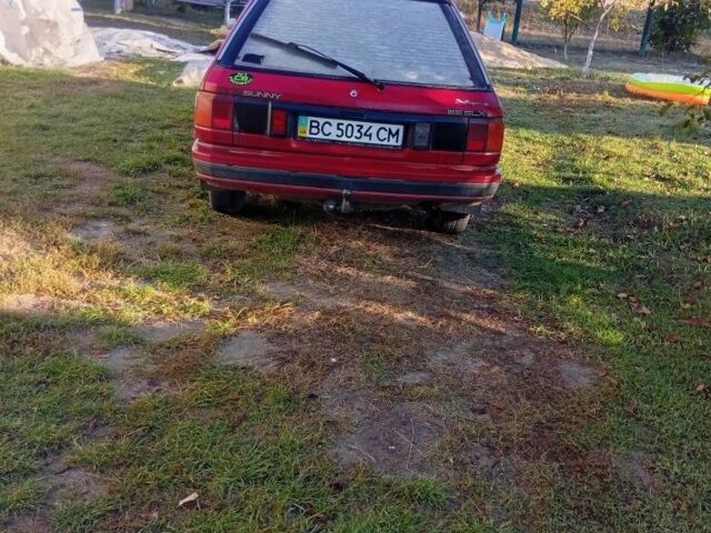 Красный Ниссан Санни, объемом двигателя 1 л и пробегом 600 тыс. км за 850 $, фото 2 на Automoto.ua