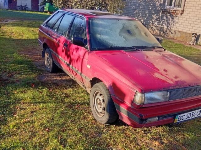 Красный Ниссан Санни, объемом двигателя 1 л и пробегом 600 тыс. км за 850 $, фото 1 на Automoto.ua