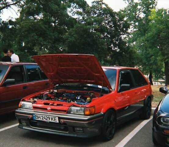 Красный Ниссан Санни, объемом двигателя 1.81 л и пробегом 300 тыс. км за 19999 $, фото 1 на Automoto.ua