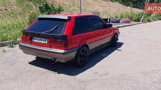 Красный Ниссан Санни, объемом двигателя 1.81 л и пробегом 300 тыс. км за 19999 $, фото 6 на Automoto.ua