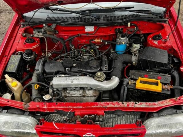 Красный Ниссан Санни, объемом двигателя 2 л и пробегом 586 тыс. км за 650 $, фото 5 на Automoto.ua