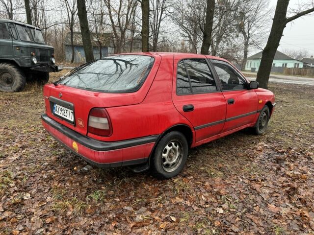 Червоний Ніссан Санні, об'ємом двигуна 1.5 л та пробігом 220 тис. км за 850 $, фото 2 на Automoto.ua