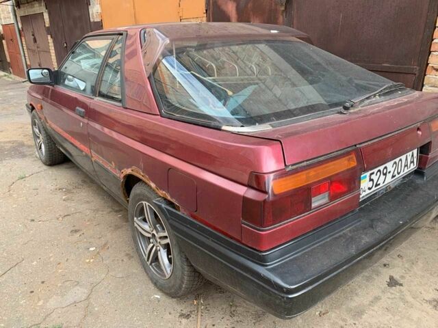 Красный Ниссан Санни, объемом двигателя 1.6 л и пробегом 210 тыс. км за 400 $, фото 6 на Automoto.ua