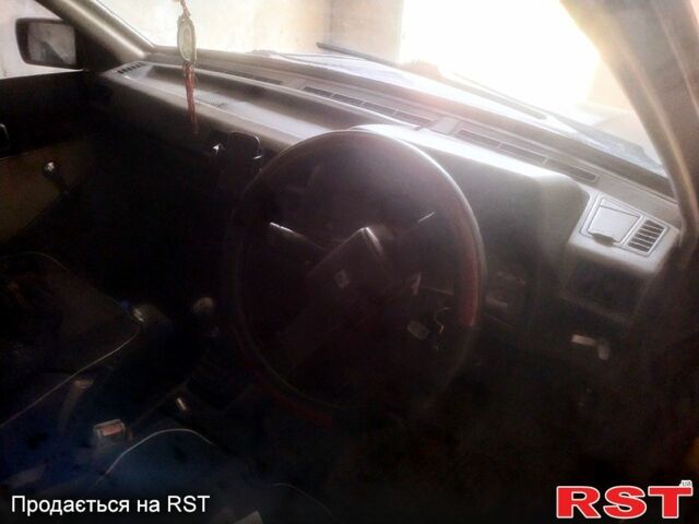 Червоний Ніссан Санні, об'ємом двигуна 1.5 л та пробігом 190 тис. км за 400 $, фото 1 на Automoto.ua