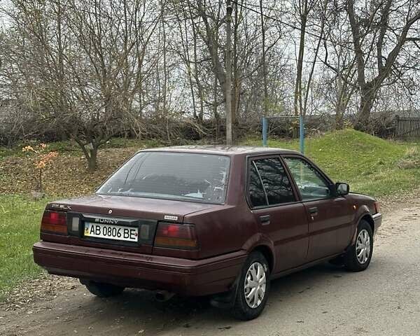 Червоний Ніссан Санні, об'ємом двигуна 1.7 л та пробігом 280 тис. км за 1450 $, фото 2 на Automoto.ua