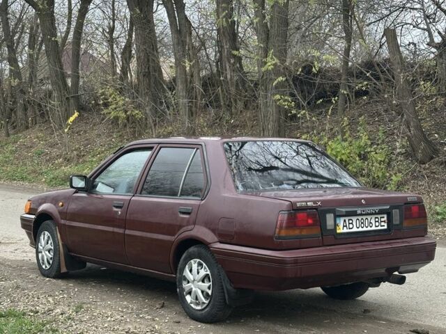 Червоний Ніссан Санні, об'ємом двигуна 1.7 л та пробігом 280 тис. км за 1450 $, фото 5 на Automoto.ua