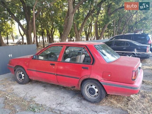 Червоний Ніссан Санні, об'ємом двигуна 1.3 л та пробігом 264 тис. км за 800 $, фото 2 на Automoto.ua