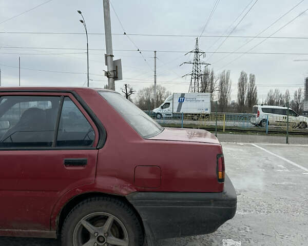 Червоний Ніссан Санні, об'ємом двигуна 1.68 л та пробігом 280 тис. км за 1500 $, фото 7 на Automoto.ua