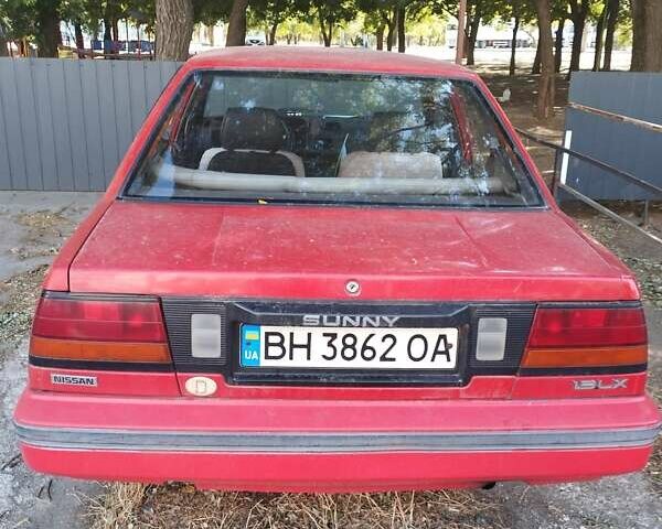 Червоний Ніссан Санні, об'ємом двигуна 1.3 л та пробігом 264 тис. км за 800 $, фото 1 на Automoto.ua