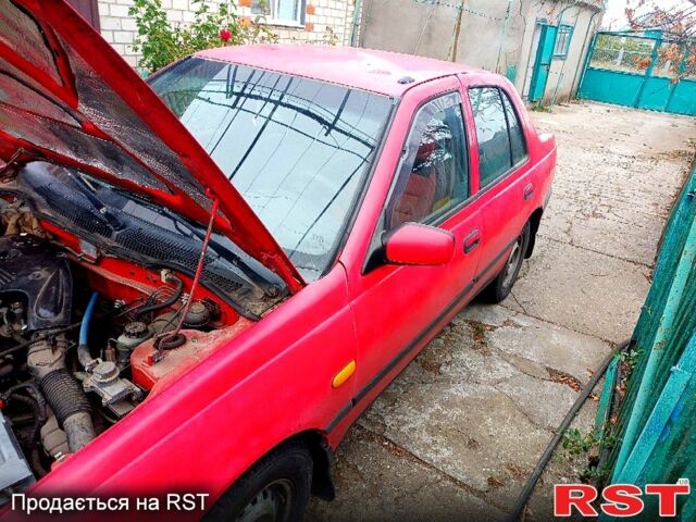 Красный Ниссан Санни, объемом двигателя 1.4 л и пробегом 435 тыс. км за 1100 $, фото 6 на Automoto.ua