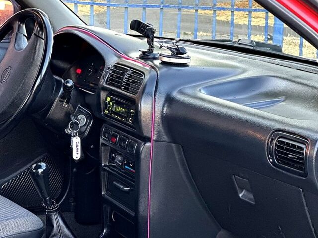 Красный Ниссан Санни, объемом двигателя 1.4 л и пробегом 350 тыс. км за 1850 $, фото 6 на Automoto.ua