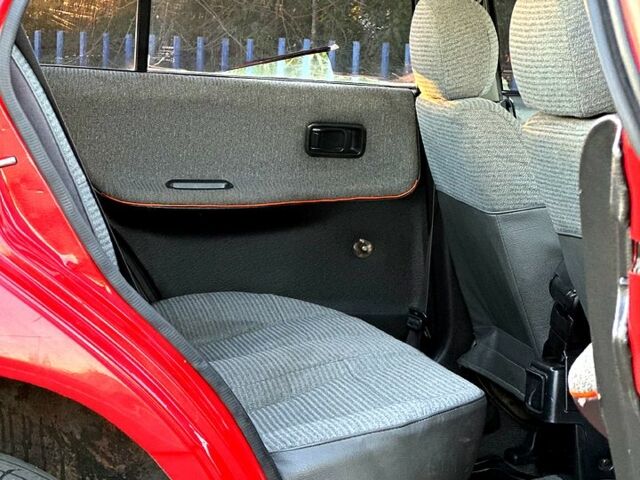 Красный Ниссан Санни, объемом двигателя 1.4 л и пробегом 350 тыс. км за 1850 $, фото 7 на Automoto.ua