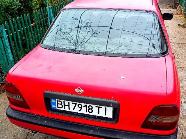 Красный Ниссан Санни, объемом двигателя 1.4 л и пробегом 435 тыс. км за 1100 $, фото 5 на Automoto.ua