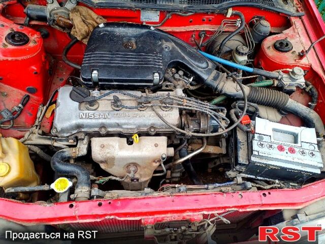 Красный Ниссан Санни, объемом двигателя 1.4 л и пробегом 435 тыс. км за 1100 $, фото 7 на Automoto.ua