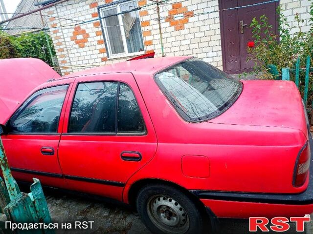 Красный Ниссан Санни, объемом двигателя 1.4 л и пробегом 435 тыс. км за 1100 $, фото 3 на Automoto.ua