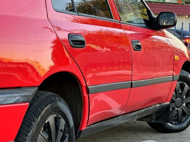 Красный Ниссан Санни, объемом двигателя 1.4 л и пробегом 350 тыс. км за 1850 $, фото 4 на Automoto.ua