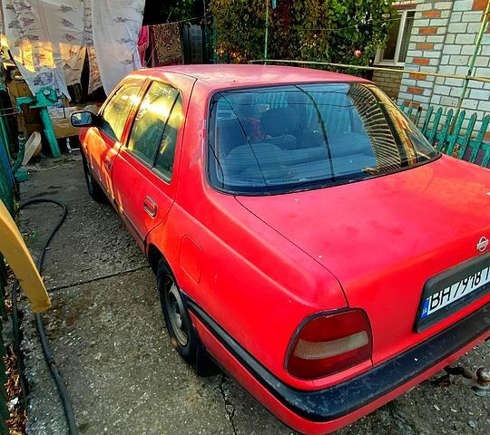 Красный Ниссан Санни, объемом двигателя 1.4 л и пробегом 435 тыс. км за 1100 $, фото 1 на Automoto.ua