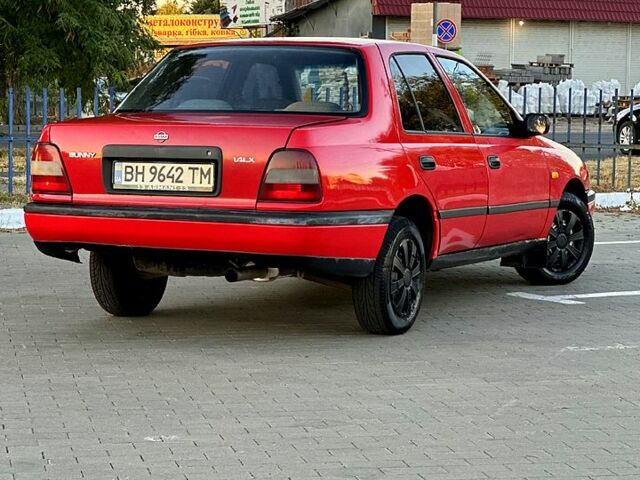 Красный Ниссан Санни, объемом двигателя 1.4 л и пробегом 350 тыс. км за 1850 $, фото 2 на Automoto.ua