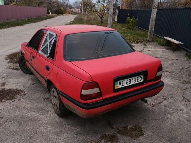 Червоний Ніссан Санні, об'ємом двигуна 1.4 л та пробігом 150 тис. км за 382 $, фото 4 на Automoto.ua