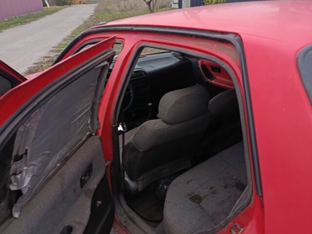 Червоний Ніссан Санні, об'ємом двигуна 1.4 л та пробігом 150 тис. км за 382 $, фото 2 на Automoto.ua