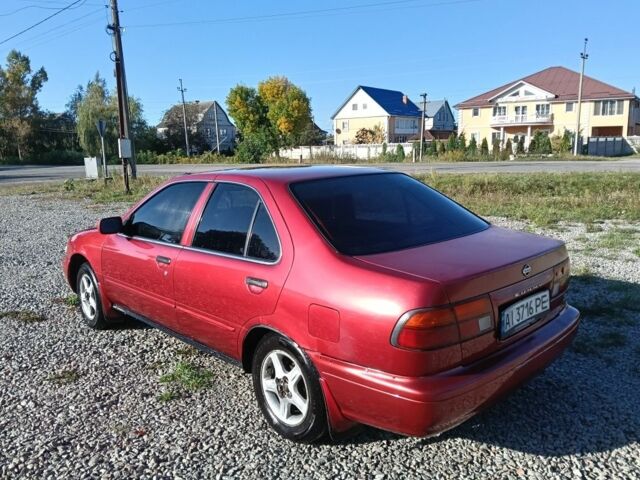 Червоний Ніссан Санні, об'ємом двигуна 1.6 л та пробігом 345 тис. км за 1650 $, фото 5 на Automoto.ua