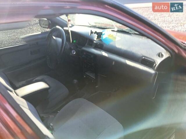 Червоний Ніссан Санні, об'ємом двигуна 1.6 л та пробігом 350 тис. км за 1650 $, фото 2 на Automoto.ua