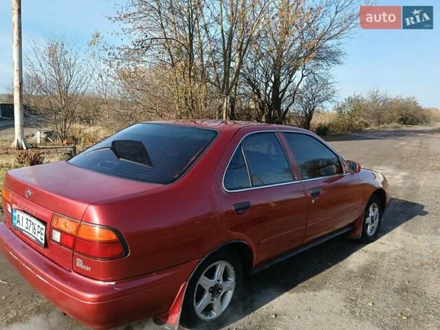 Червоний Ніссан Санні, об'ємом двигуна 1.6 л та пробігом 350 тис. км за 1650 $, фото 5 на Automoto.ua