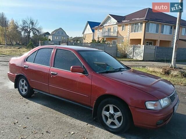 Червоний Ніссан Санні, об'ємом двигуна 1.6 л та пробігом 350 тис. км за 1650 $, фото 7 на Automoto.ua