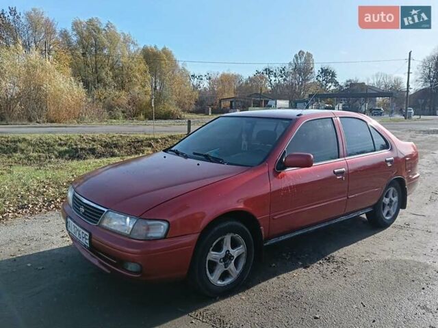 Червоний Ніссан Санні, об'ємом двигуна 1.6 л та пробігом 350 тис. км за 1650 $, фото 6 на Automoto.ua