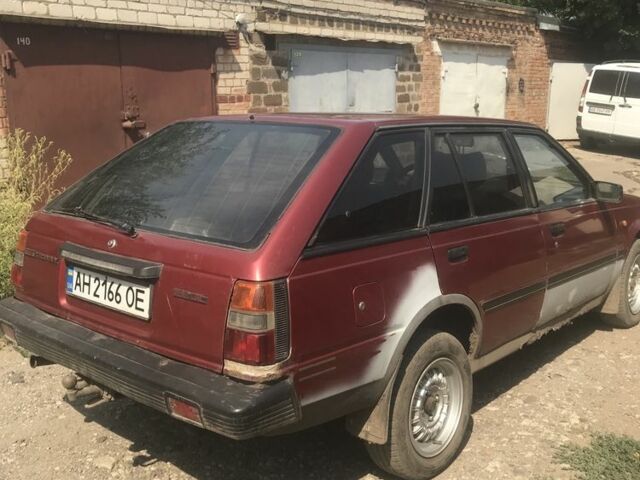 Красный Ниссан Санни, объемом двигателя 1.7 л и пробегом 250 тыс. км за 840 $, фото 3 на Automoto.ua