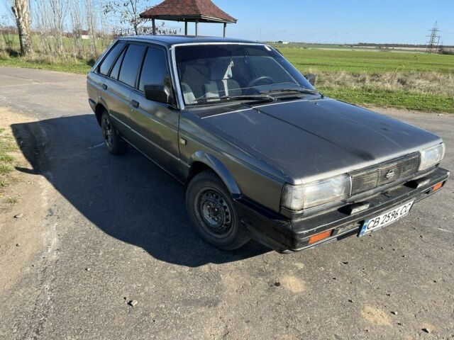 Сірий Ніссан Санні, об'ємом двигуна 1.6 л та пробігом 250 тис. км за 750 $, фото 1 на Automoto.ua