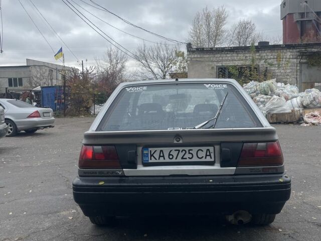 Серый Ниссан Санни, объемом двигателя 1.8 л и пробегом 244 тыс. км за 1500 $, фото 1 на Automoto.ua