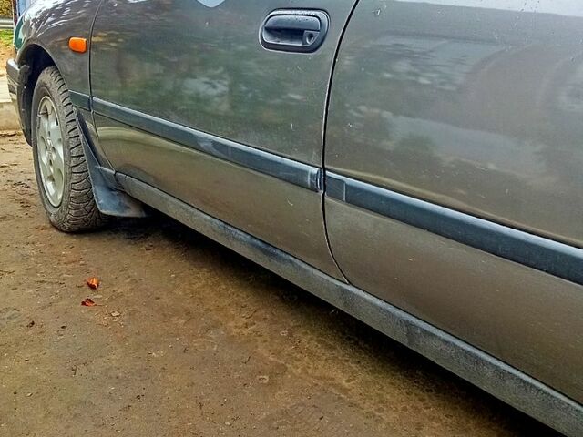 Сірий Ніссан Санні, об'ємом двигуна 1.6 л та пробігом 200 тис. км за 1200 $, фото 4 на Automoto.ua