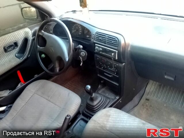 Сірий Ніссан Санні, об'ємом двигуна 1.4 л та пробігом 414 тис. км за 1750 $, фото 4 на Automoto.ua