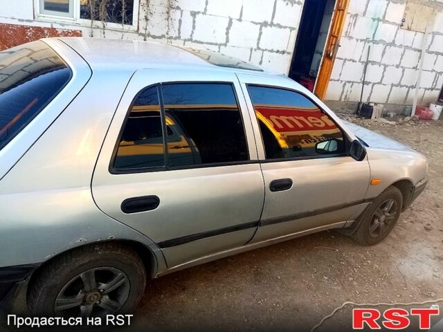 Сірий Ніссан Санні, об'ємом двигуна 1.4 л та пробігом 414 тис. км за 1750 $, фото 3 на Automoto.ua