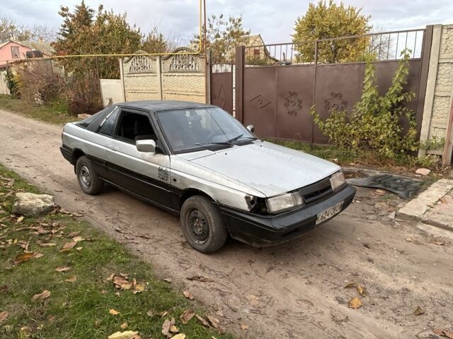 Серый Ниссан Санни, объемом двигателя 1.5 л и пробегом 580 тыс. км за 600 $, фото 5 на Automoto.ua