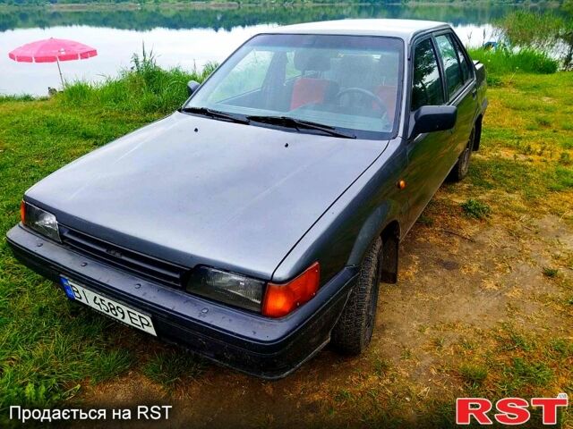 Серый Ниссан Санни, объемом двигателя 1.7 л и пробегом 100 тыс. км за 1500 $, фото 2 на Automoto.ua