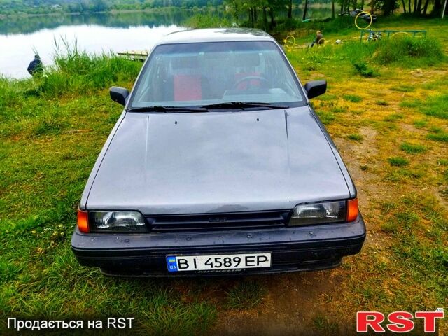 Серый Ниссан Санни, объемом двигателя 1.7 л и пробегом 100 тыс. км за 1500 $, фото 1 на Automoto.ua