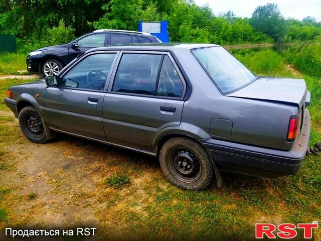 Серый Ниссан Санни, объемом двигателя 1.7 л и пробегом 100 тыс. км за 1500 $, фото 4 на Automoto.ua