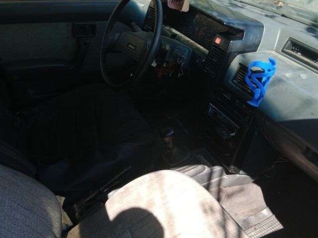 Сірий Ніссан Санні, об'ємом двигуна 1.3 л та пробігом 300 тис. км за 716 $, фото 5 на Automoto.ua