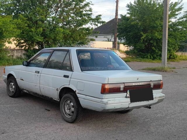 Серый Ниссан Санни, объемом двигателя 1.7 л и пробегом 1 тыс. км за 263 $, фото 6 на Automoto.ua