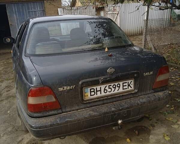 Серый Ниссан Санни, объемом двигателя 1.39 л и пробегом 58 тыс. км за 650 $, фото 1 на Automoto.ua
