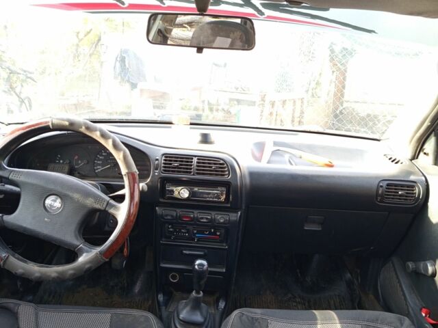 Сірий Ніссан Санні, об'ємом двигуна 1.5 л та пробігом 200 тис. км за 1200 $, фото 6 на Automoto.ua