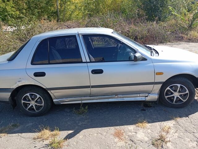 Серый Ниссан Санни, объемом двигателя 1.4 л и пробегом 280 тыс. км за 1800 $, фото 5 на Automoto.ua